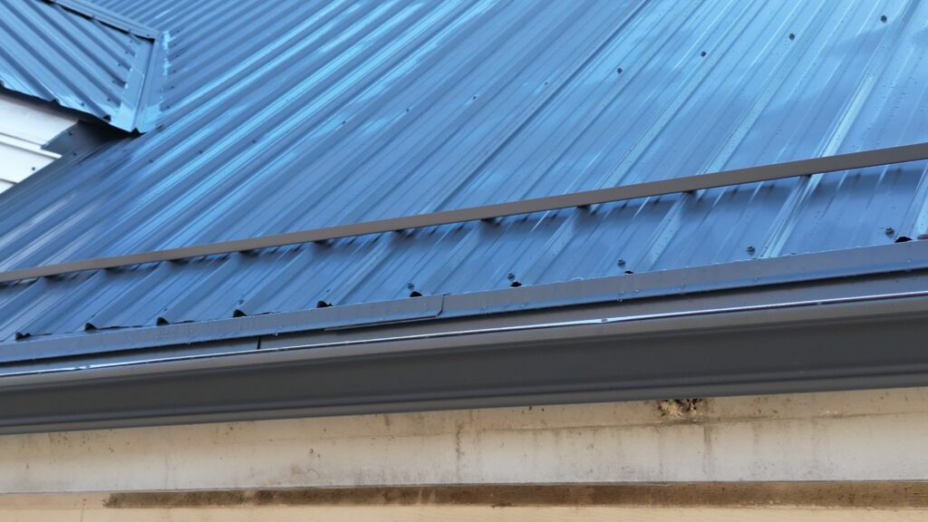 gutter system installed on a metal roof