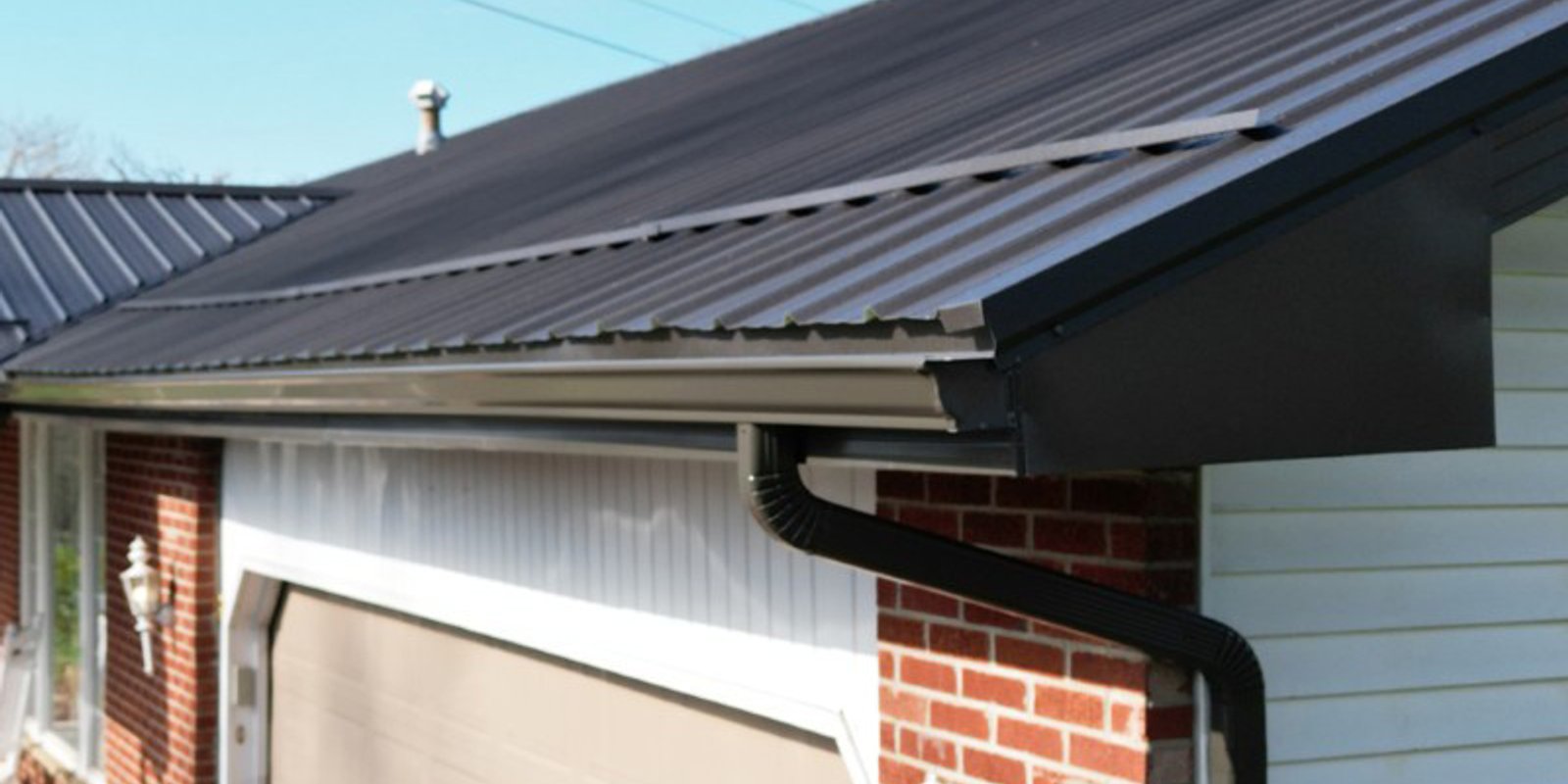Seamless gutters and downspout installed by Platinum Home Exteriors