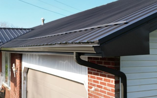 Seamless gutters and downspout installed by Platinum Home Exteriors