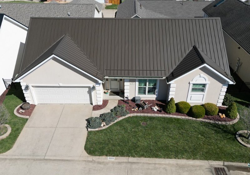 Restored standing seam metal roof by Platinum Home Exteriors