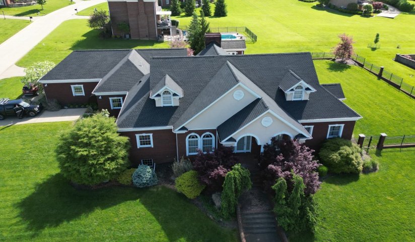 Platinum Home Exteriors crew installing a shingle roof in Ohio
