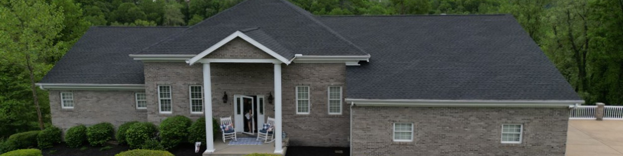 Ridge vent installed along the peak of a shingle roof by Platinum Home Exteriors
