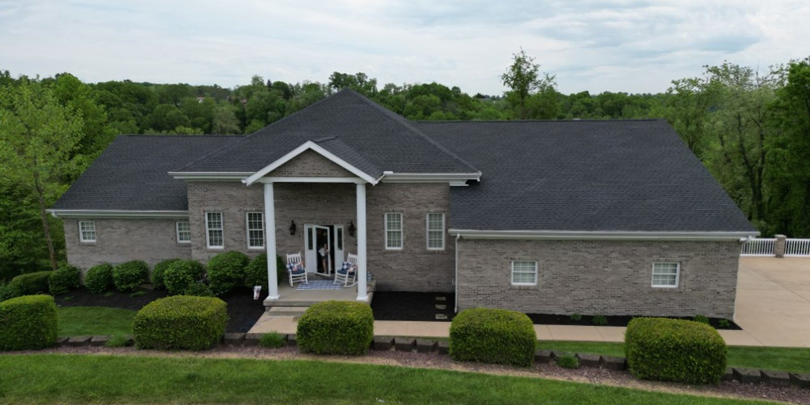 Ridge vent installed along the peak of a shingle roof by Platinum Home Exteriors