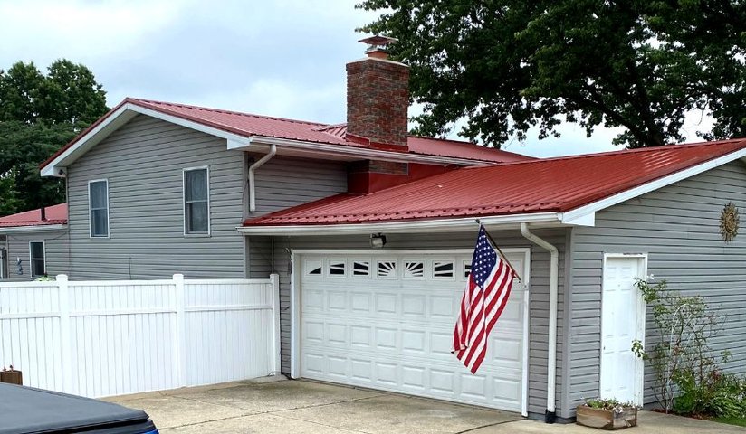 Red Metal Roof Replacement on Garage and House