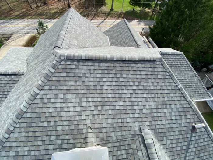 aerial view of a grey shingle roof